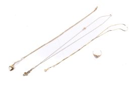 A small group of gold and yellow metal jewellery.