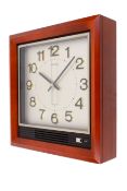 Mid-century Seiko Quartz battery operated chiming wall clock.