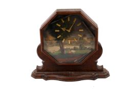 An oak cased mantel clock with a painted face 'Windsor Castle'.