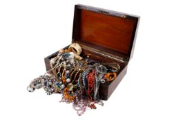 A brass bound Victorian mahogany box filled with contemporary costume jewellery.