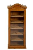 A contemporary pine wall mounted glazed display cabinet.
