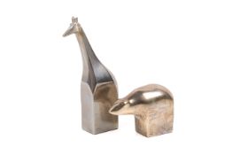 Two Dansk Designs Japan cast metal animal paperweights. Modelled as a polar bear and a giraffe. Max.