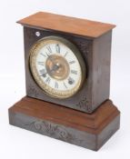A 19th century steel cased mantel clock.