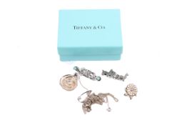 A small group of silver jewellery.