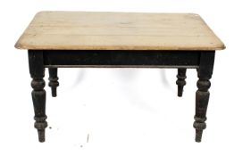 A Victorian four plank scrub top pine kitchen table.