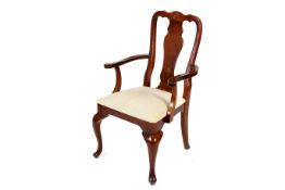 A 20th century mahogany framed open armchair. With cream upholstered seat.