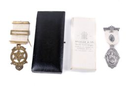 Two Masonic medals.