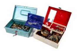 A small quantity of mixed costume jewellery in a jewellery box and a cash tin.