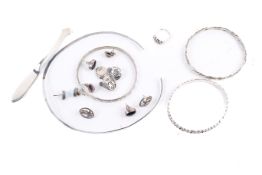 A collection of assorted silver and white metal jewellery.