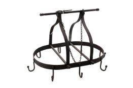 An antique style wrought iron hanging pan rack. Of oval form with eight hooks.