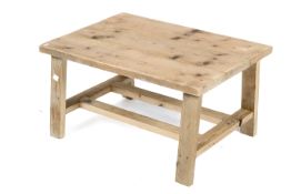 A handmade pine coffee table. With three plank rectangular top.