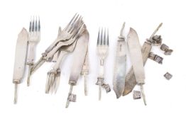 A quantity of silver knife and forks without the handles. Gross weight 382.7g.