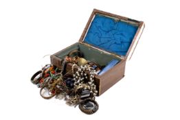 A jewellery box of assorted costume jewellery.