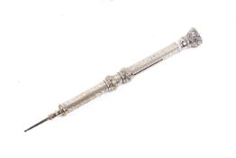 A gilt white metal propelling pencil, possibly 9ct gold.