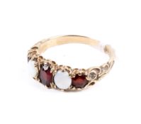 A 9ct opal and garnet ring.