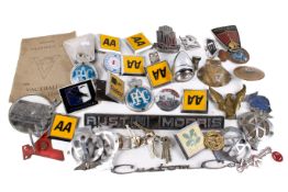 A collection of assorted automobilia. Including car badges and other accessories, etc.