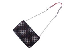 A Christian Louboutin shoulder bag.