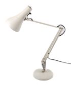 Anglepoise Lighting Ltd model 90 desk lamp. On a circular base.