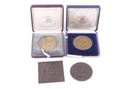 Four vintage medallions.