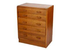 A mid-century G-Plan Brando oak chest of drawers designed by E. Gomme. Consisting of five drawers.