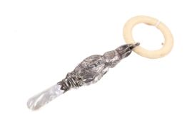 A vintage silver Peter Rabbit teether.