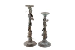 Two large brass candlesticks. With holly leaf decoration. Max.