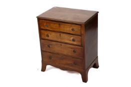 A small 19th century mahogany chest of drawers. Having four drawers raised on bracket feet.