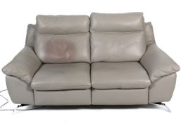 A two-section light grey leather power recliner sofa by motion group #6114.