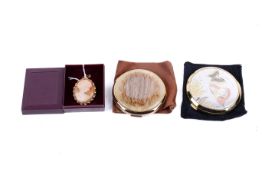 A 9ct gold mounted cameo brooch and two contemporary powder compacts. The cameo by E.J.
