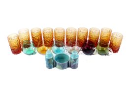 Set of ten mid-century textured orange glass drinking beakers, etc. Max.