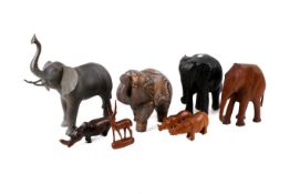 A large collection of assorted elephant ornaments. Including bookends, etc. Max.