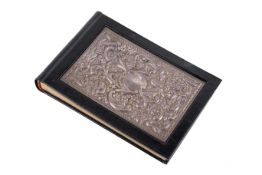 A silver inlaid photograph album.