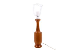 A mid-century turned bottle shaped wooden table lamp base.