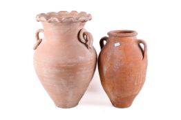 Two terracotta twin handle urn shaped vases. Max.