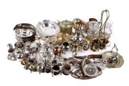 A large collection of assorted silverplate items. Including mug, jugs and a tea pot, etc.