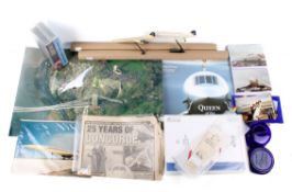 A collection of assorted Concorde ephemera. Including photographs, calendars, videos and two models.