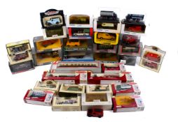 A collection of assorted diecast model vehicles. Including a Corgi, Lledo Trackside and City, etc.