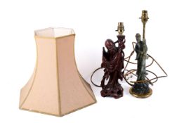 Two Chinese style figure lamps and one shade. One carved from wood the other carved from soapstone.