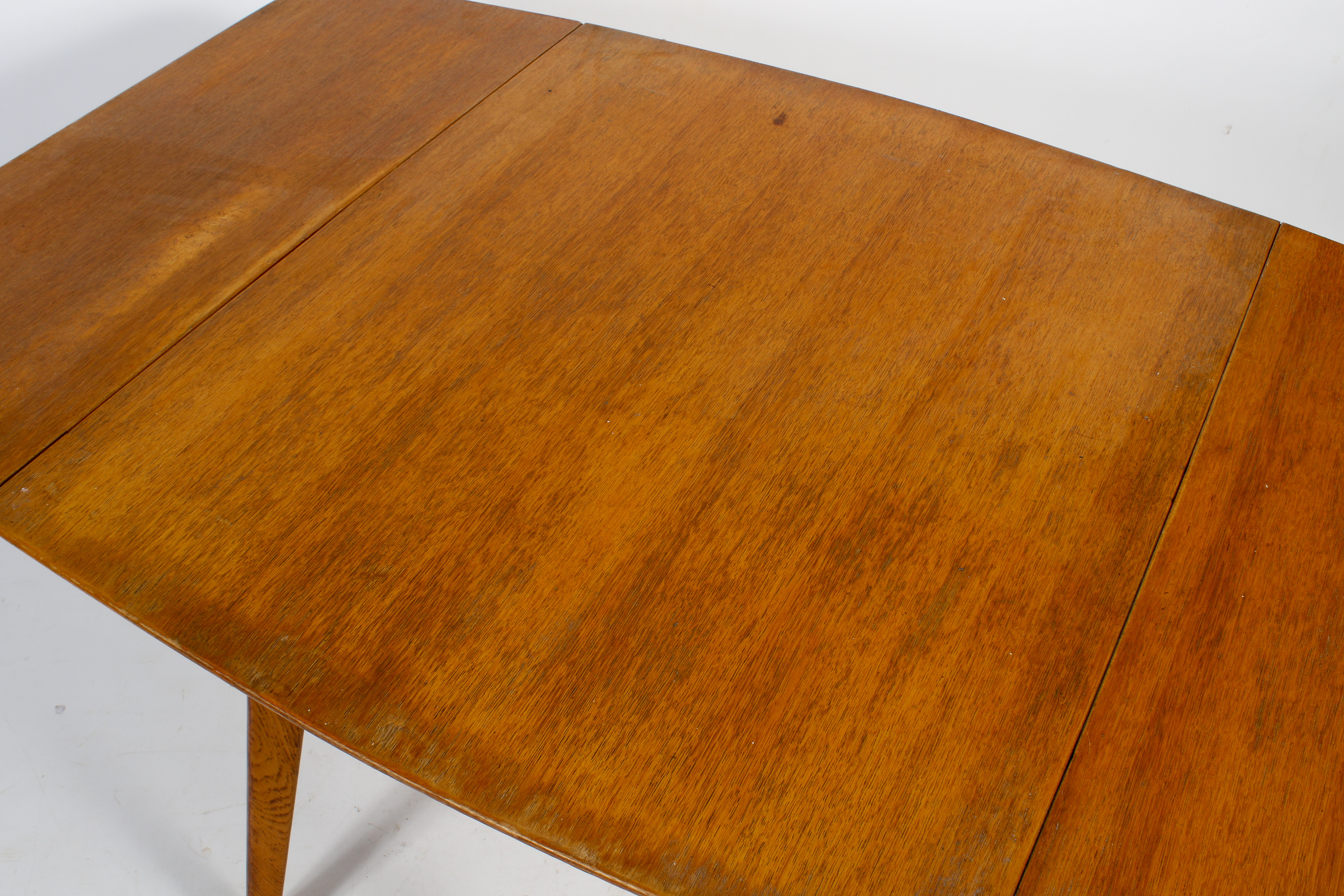 A mid-century G-Plan oak drop leaf table and four chairs by E Gomme. H75cm x W80cm x D138cm (open). - Image 3 of 5
