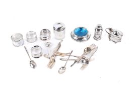 A collection of silver table items.