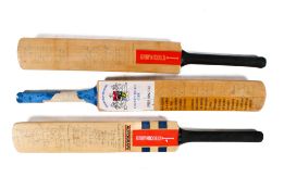 Three cricket bats signed by Gloucestershire County Cricket Club.