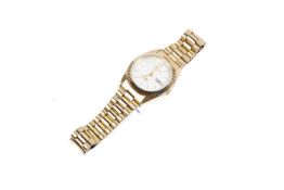 A Citizen watch yellow metal bracelet watch.