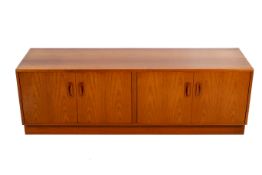 Two assorted mid-century G-Plan cabinets. Including a four door cabinet H53.