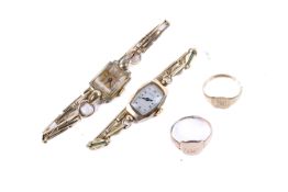 Two ladies watches, a 9ct gold solitaire ring and another unmarked yellow metal ring.