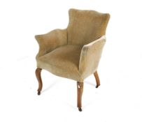 A 19th century French Napoleon walnut and green velvet upholstered armchair.