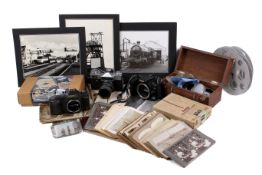 An assortment of cameras and related items. Including stereographic cards, etc.