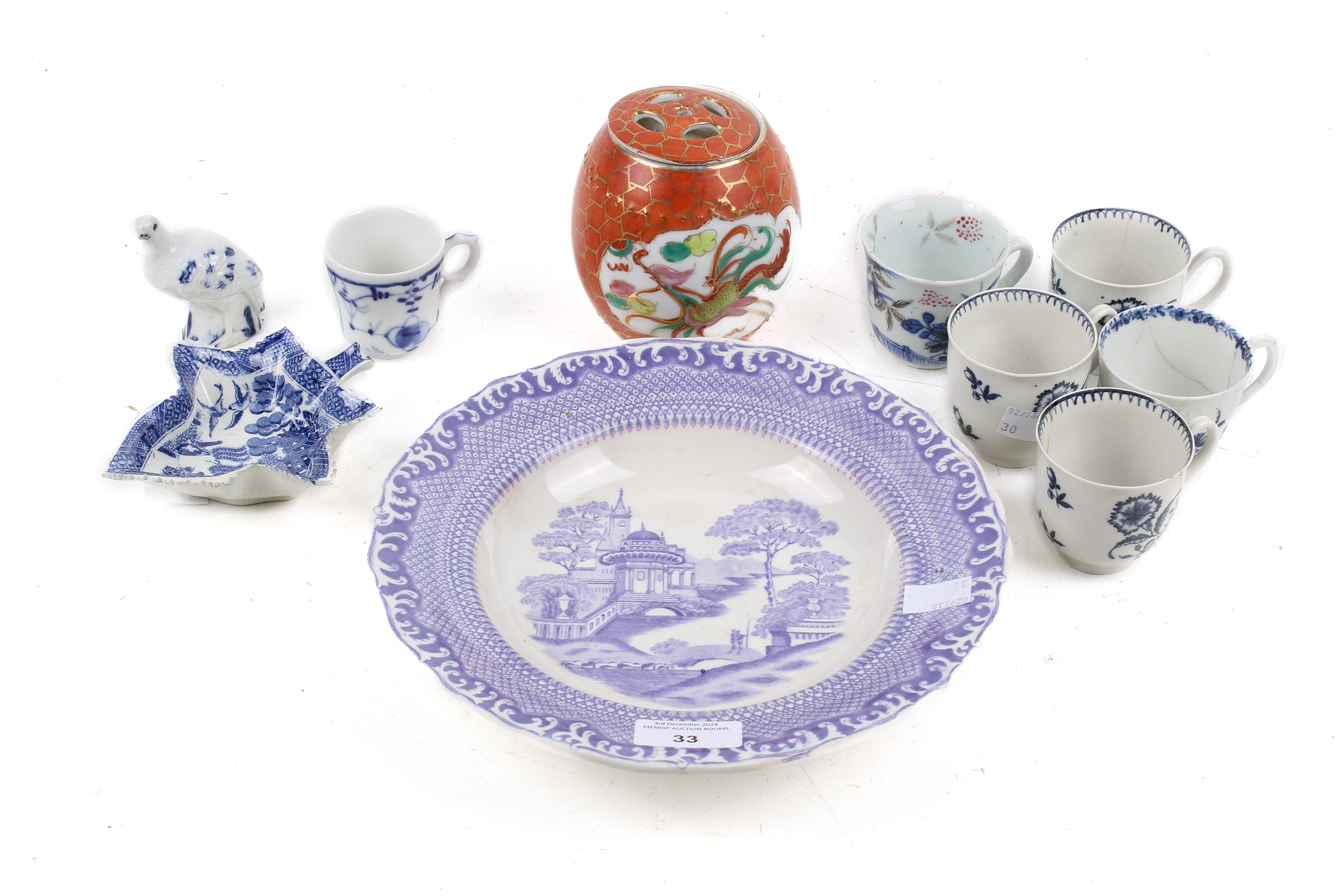 An assortment of blue and white ceramics. Including four early English porcelain tea cups, etc. Max.