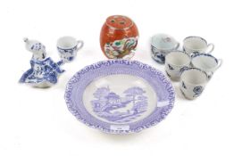 An assortment of blue and white ceramics. Including four early English porcelain tea cups, etc. Max.