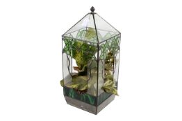 An early 20th century terrarium.