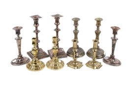 Five pairs of candlesticks. Consisting of two silver plated pairs and three brass pairs. Max.